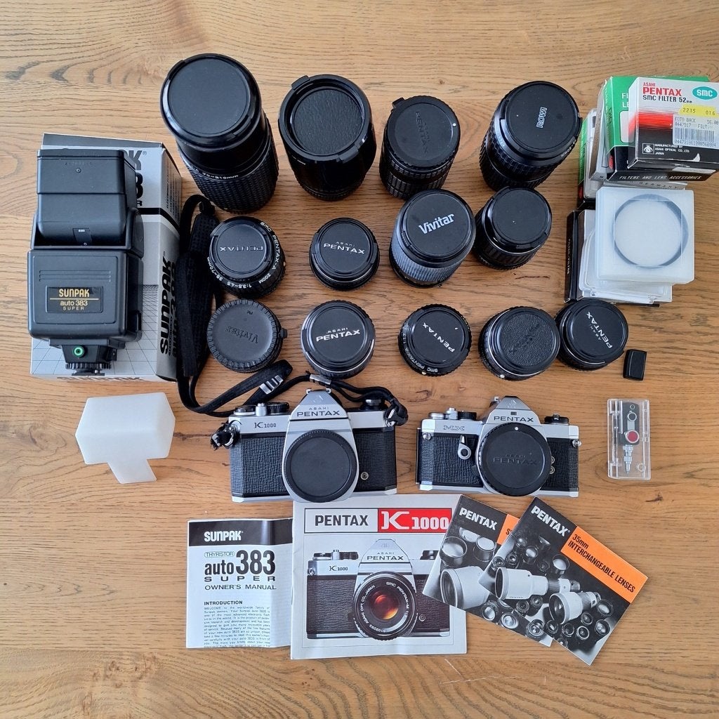 Pentax MX en K1000 met lenzen, filters, flitser en extra's, Ophalen of Verzenden, Gebruikt, Spiegelreflex, Pentax