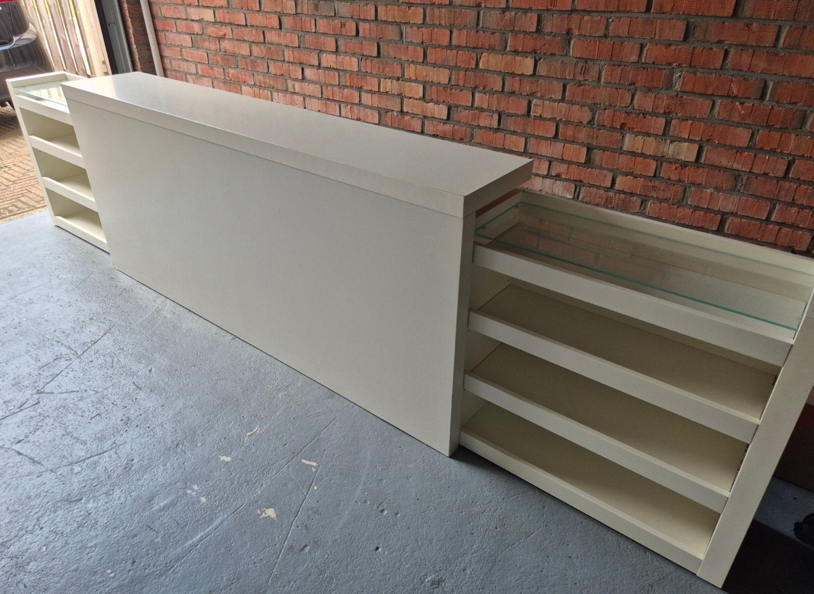 Ikea achterwand met inschuifbare boekenkasten, Ophalen