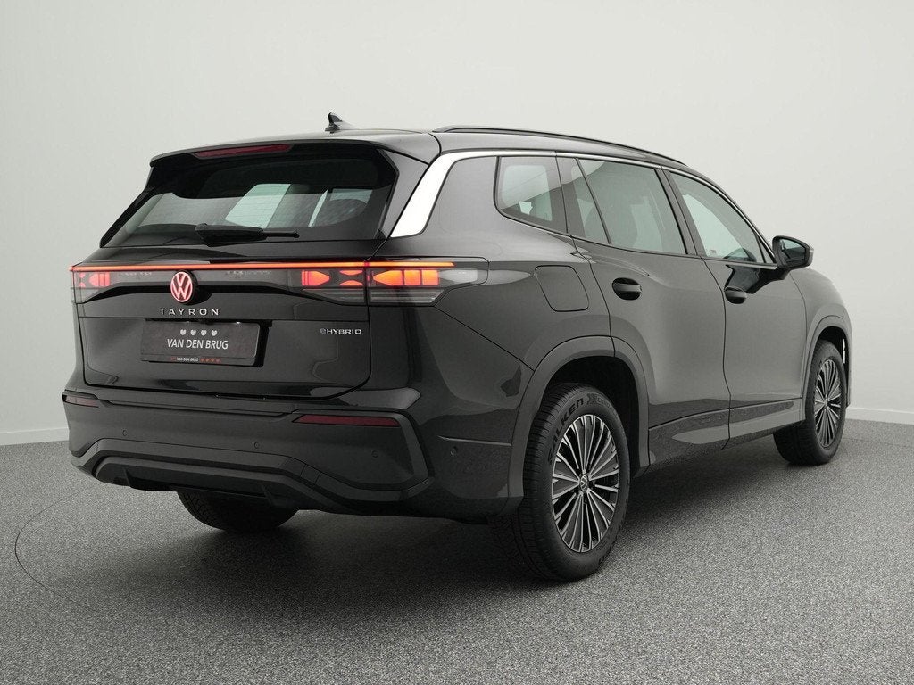 Volkswagen Tayron 1.5 eHybrid 204 PK Life Edition | LED Plus, Auto's, Volkswagen, Stof, 4 cilinders, Zwart, Bedrijf