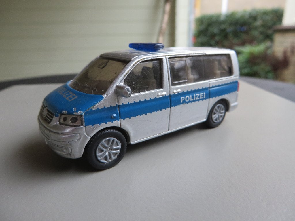 Siku Volkswagen T5 Multivan POLIZEI, Hobby en Vrije tijd, Modelauto's | Overige schalen, Ophalen of Verzenden, Gebruikt, Auto