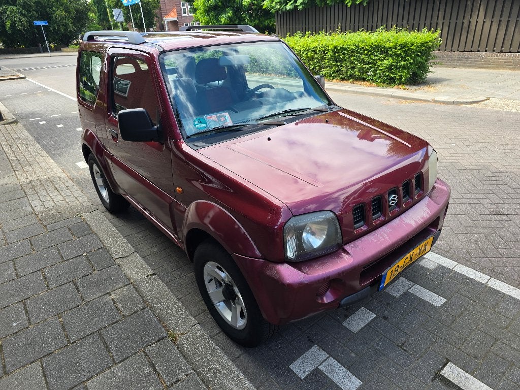 Suzuki Jimny 1.3 JX 4WD 2001 Rood, Auto's, Suzuki, 4 cilinders, Origineel Nederlands, Handgeschakeld, 1000 kg
