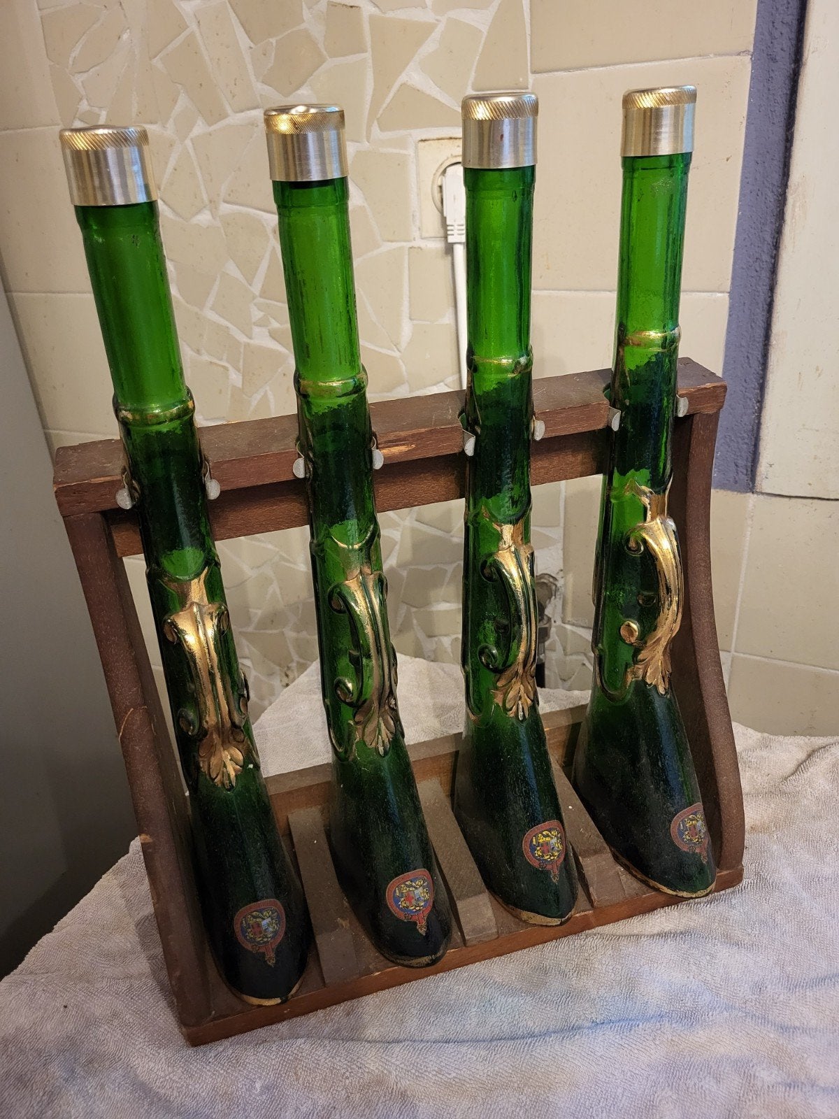 Set van 4 antieke groene glazen flessen in geweer-vorm, Ophalen of Verzenden