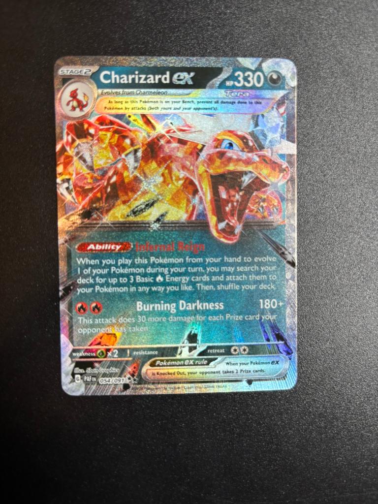 Charizard ex (PAF 054), Hobby en Vrije tijd, Verzamelkaartspellen | Pokémon, Ophalen of Verzenden, Zo goed als nieuw