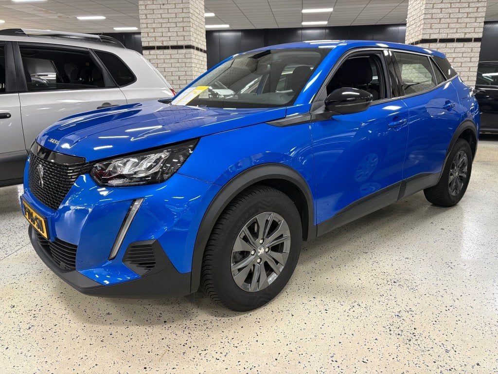 Peugeot 2008 1.2 Navigatie Apple Android PDC Camera ECC Airc, Gebruikt, 1199 cc, Met garantie (alle), Blauw
