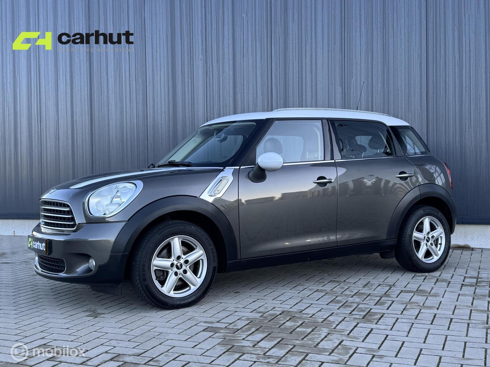 Mini Countryman| NL auto met NAP|Stoelverwarming|nwe Distrb., Auto's, Voorwielaandrijving, Euro 5, Gebruikt, Zwart