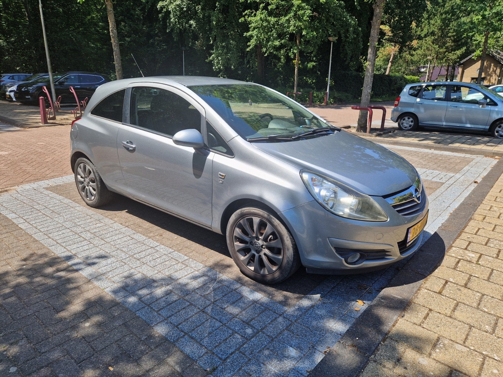 Opel Corsa 1.2 16V 3D 2011 Grijs 124xxx km, Voorwielaandrijving, 40 €/maand, 1229 cc, Origineel Nederlands
