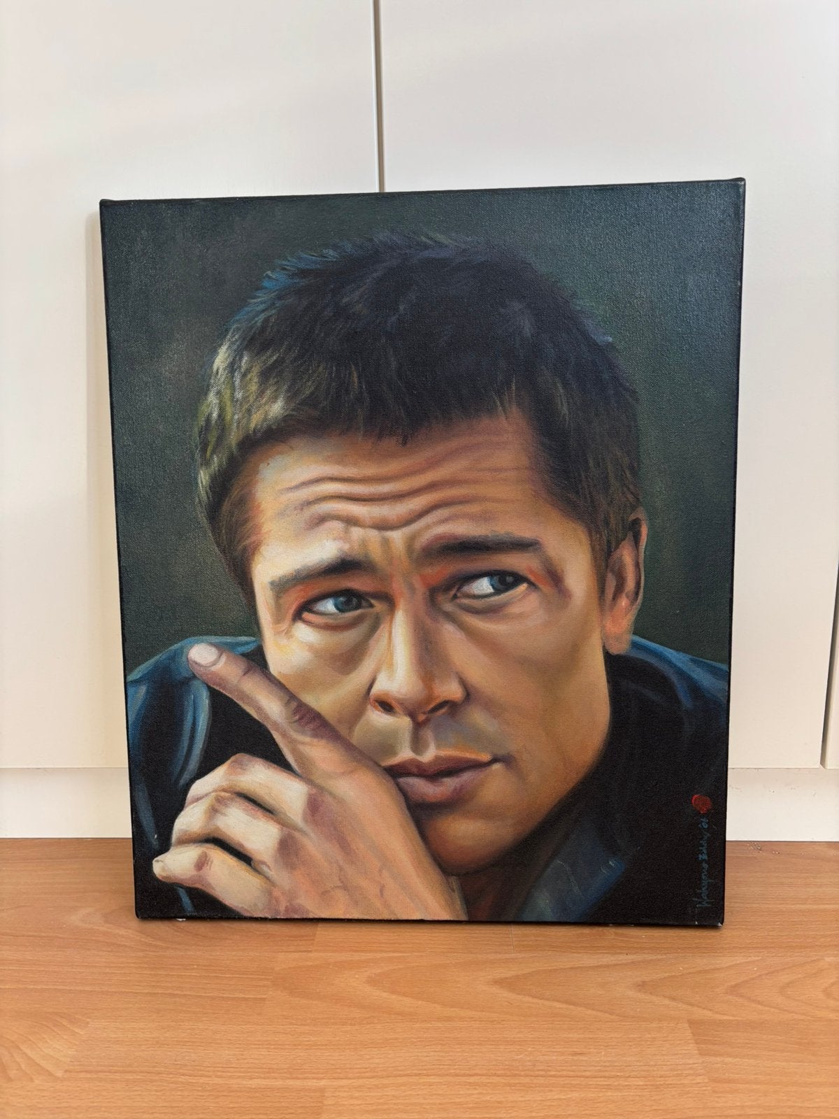 Schilderij van Brad Pitt, Ophalen