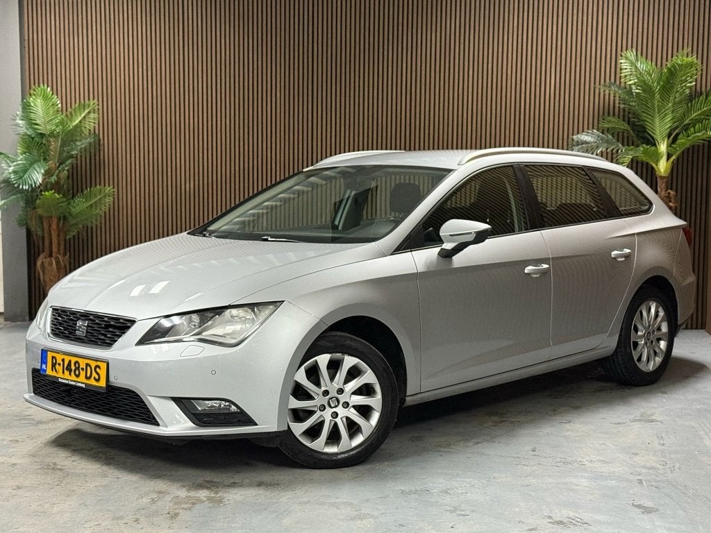 SEAT Leon ST 1.2 TSI Style (bj 2017, automaat), Auto's, Gebruikt, Euro 6, 4 cilinders, Automatische klimaatregeling