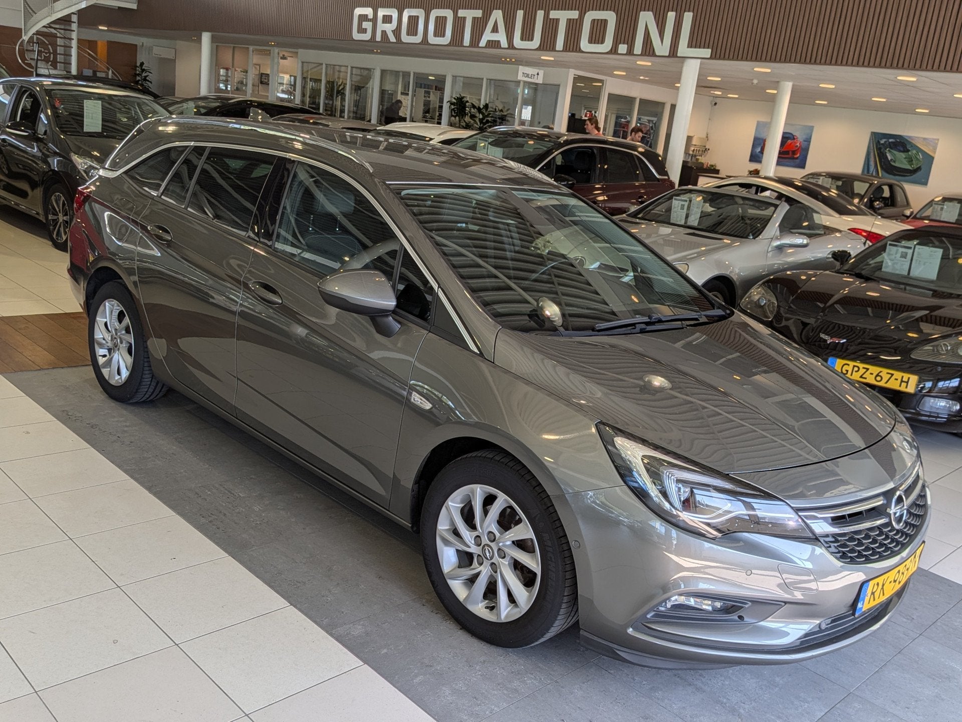 Opel Astra Sports Tourer 1.0 Innovation Airco, Cruise Contro, Auto's, Opel, Voorwielaandrijving, Gebruikt, Euro 6, 1178 kg