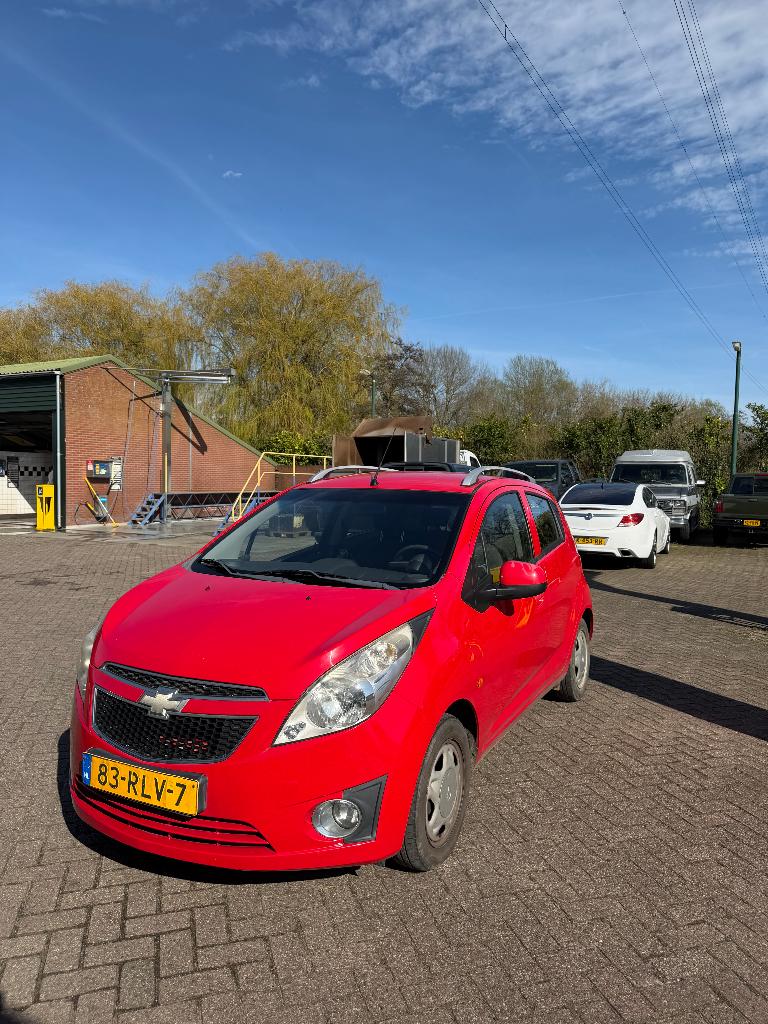 Chevrolet Spark 2011 Rood, Auto's, Voorwielaandrijving, Stof, 4 cilinders, 68 pk