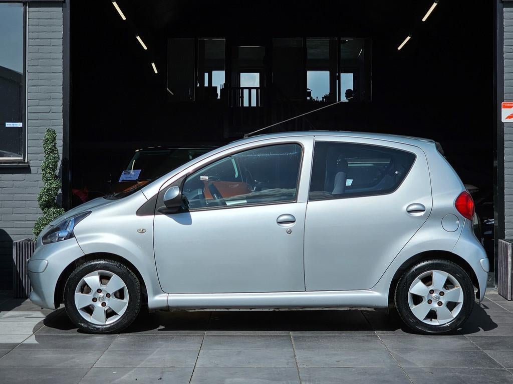 Toyota Aygo 1.0-12V|Airco|El. Ramen|AUX|5 deurs|APK, Auto's, Toyota, Voorwielaandrijving, Stof, Gebruikt, Huisgarantie