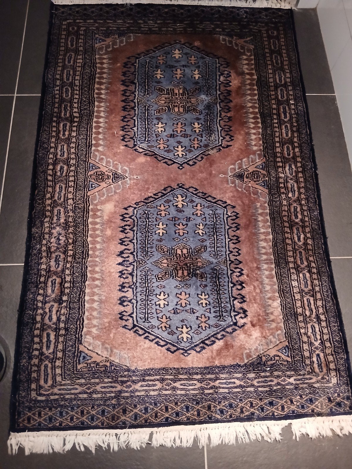 tapijt 150 bij 93, Ophalen