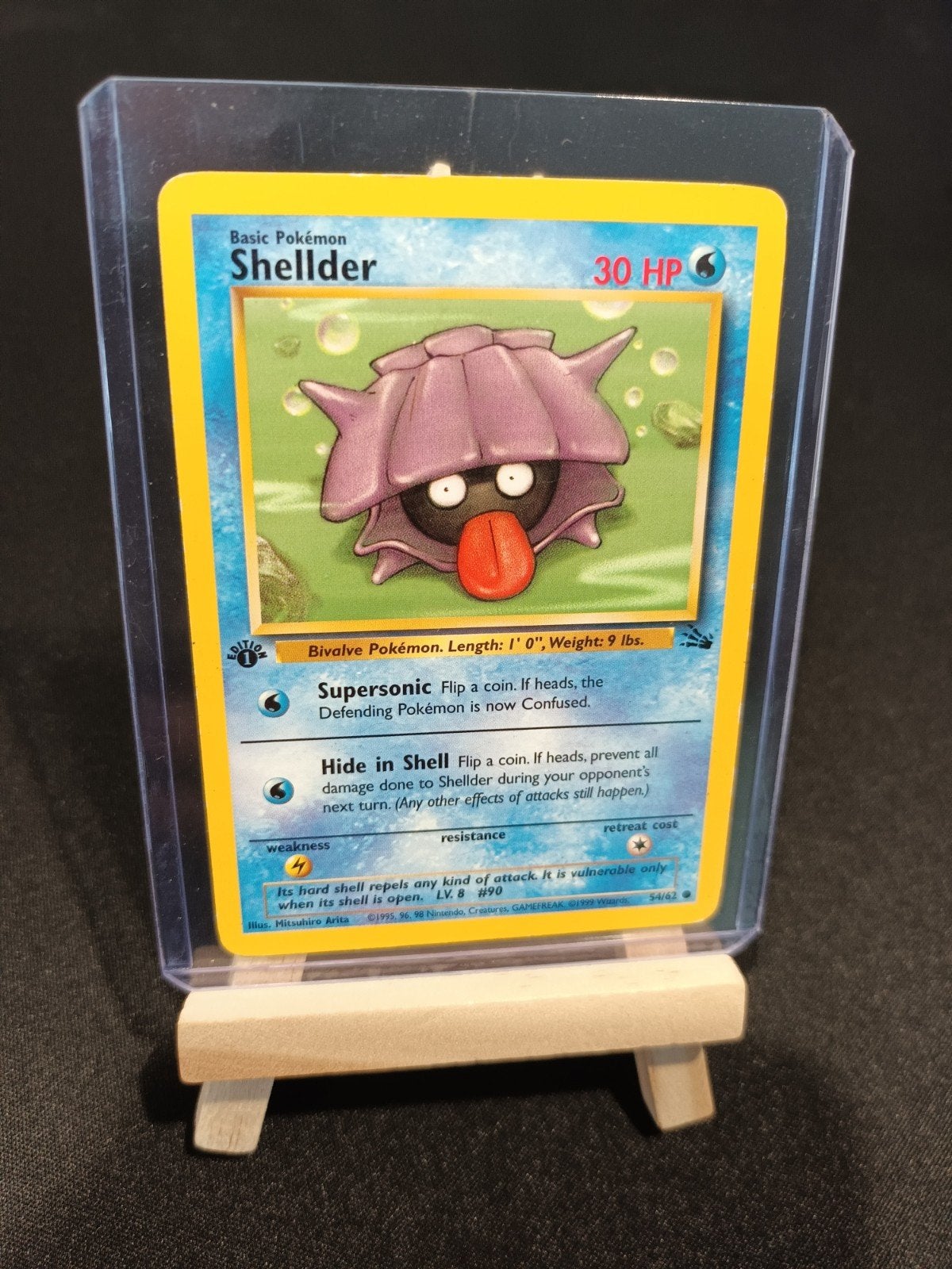 Shellder 54/62 - 1st Edition - Fossil set - Mitsuhiro Arita, Ophalen of Verzenden, Gebruikt, Losse kaart