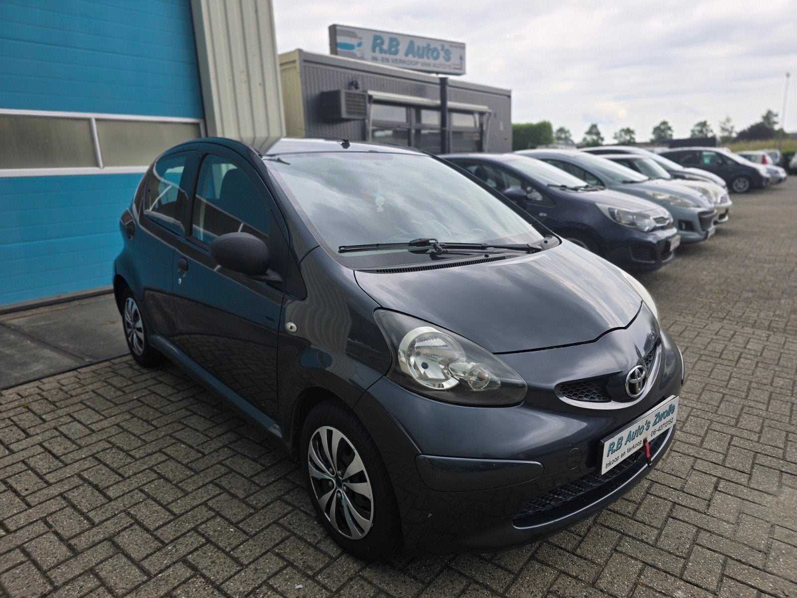 Toyota Aygo 1.0 12V Vvt-i 5DRS 2007 Grijs, Auto's, Toyota, Voorwielaandrijving, Stof, Zwart, 4 stoelen