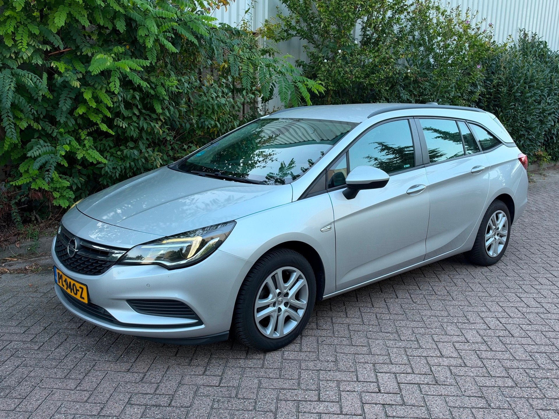 Opel Astra Sports Tourer 1.0 Online Edition APK 05-2027 Airc, Auto's, Voorwielaandrijving, Parkeersensor, Stof, Gebruikt