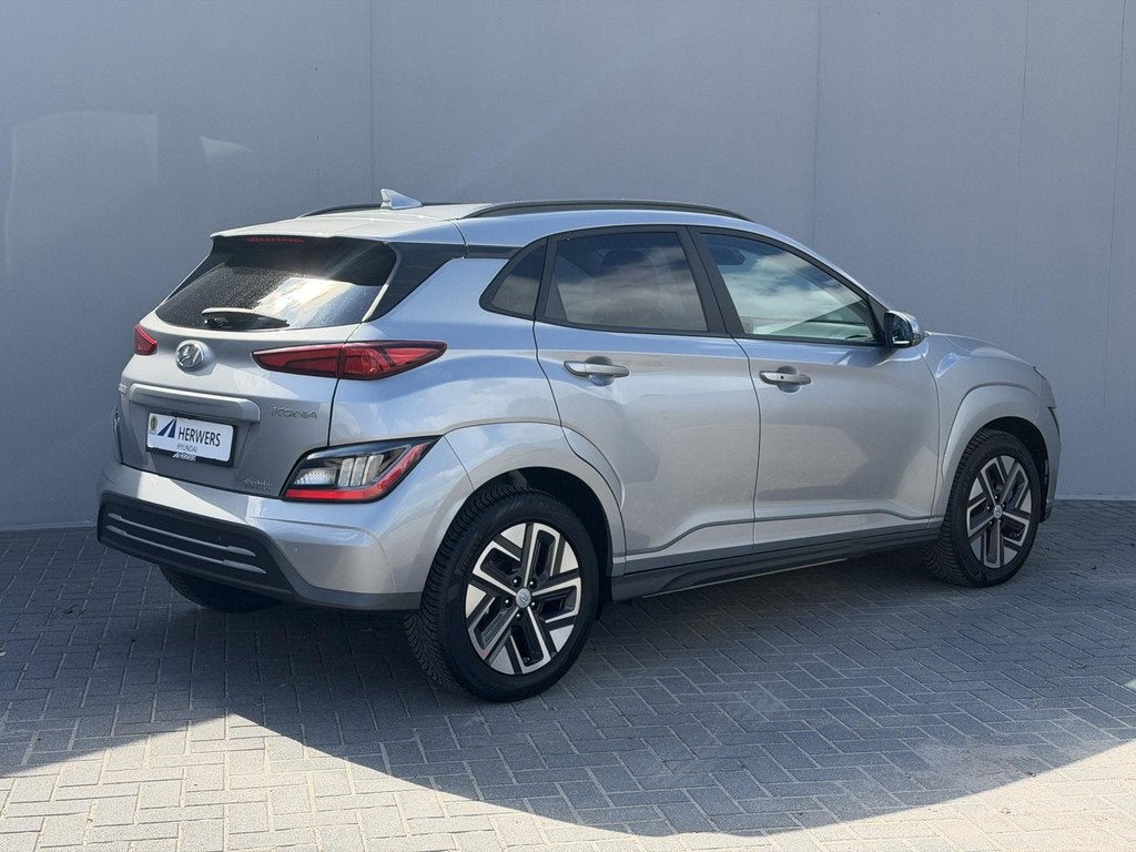 Hyundai Kona EV Comfort 39 kWh / Accu SOH 91% / Warmtepomp /, Auto's, Hyundai, Automatische klimaatregeling, 39 kWh, 305 km, SUV of Terreinwagen