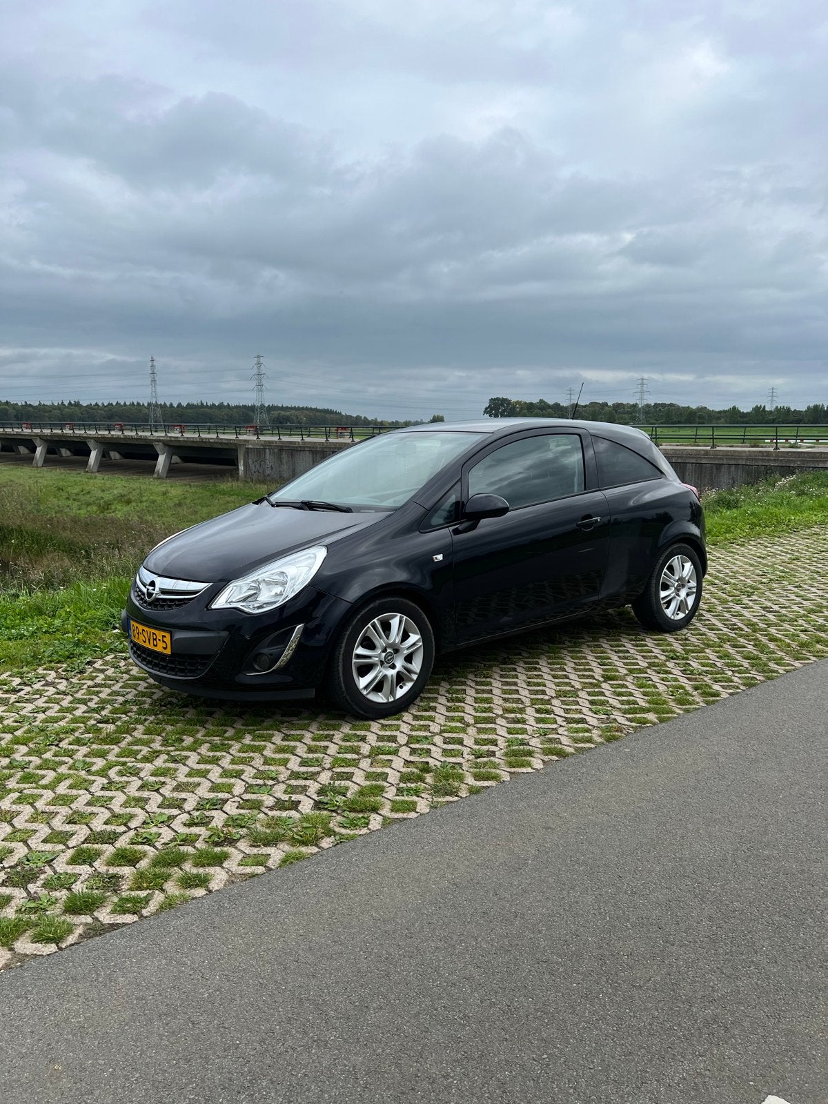 Opel Corsa 1.2 16V 3D Easytronic 2011 Zwart, Auto's, 450 kg, 40 €/maand, 750 kg, 1229 cc