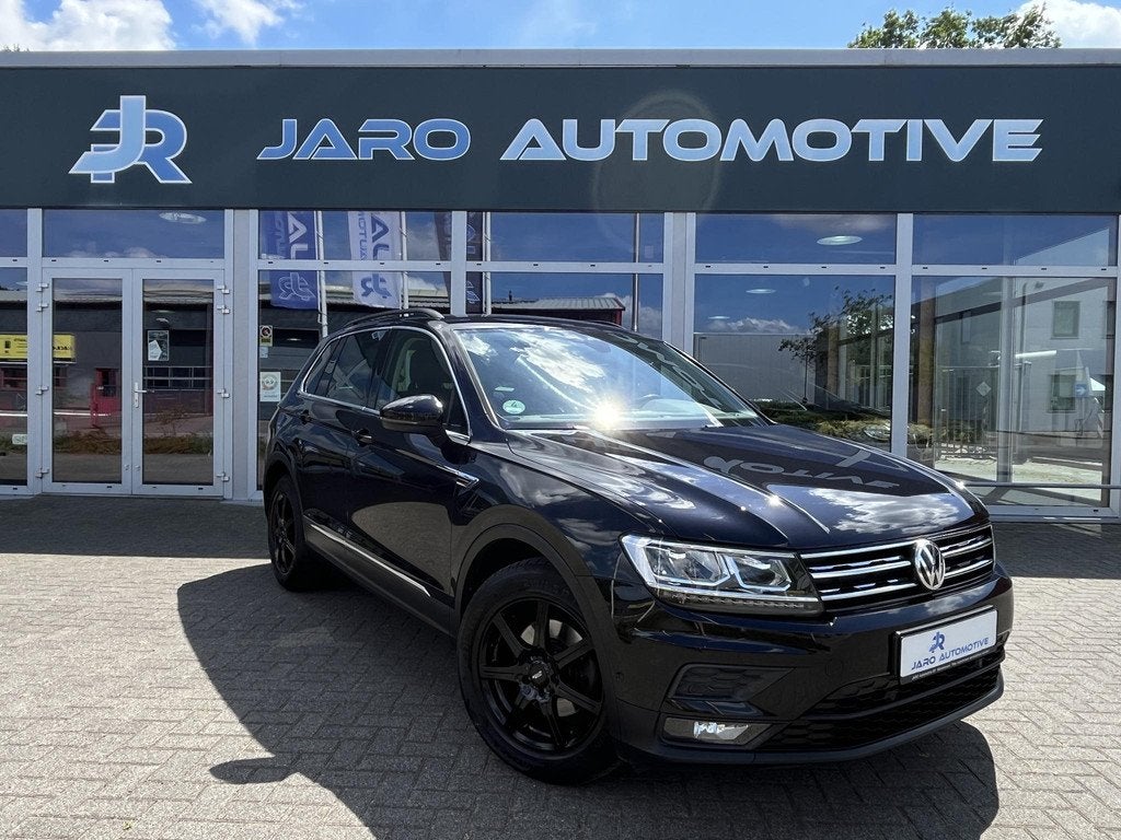 Volkswagen Tiguan 1.4 TSI Comfortline | ACC | Executive pakk, Auto's, Gebruikt, 4 cilinders, Zwart, Origineel Nederlands