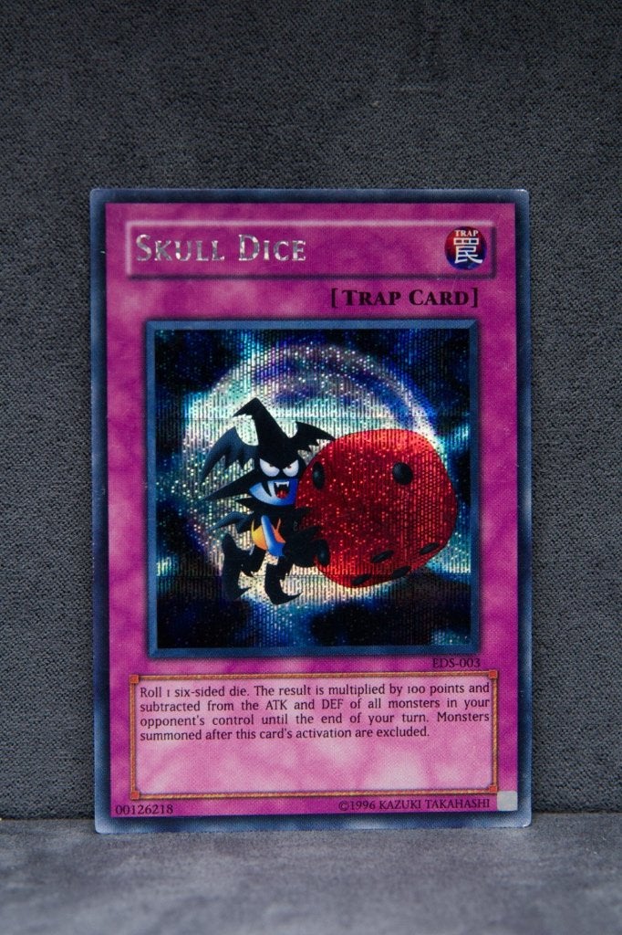 Yu-Gi-Oh! Skull Dice EDS-003 Secret Rare EX, Ophalen of Verzenden, Zo goed als nieuw, Losse kaart, Foil