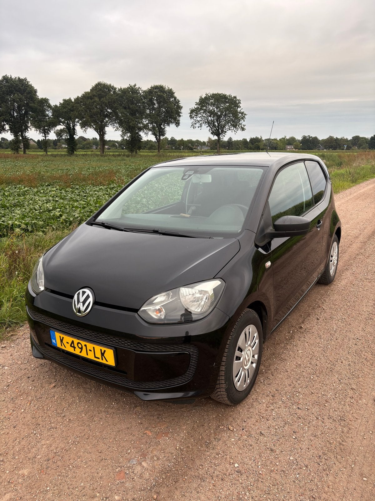 Volkswagen up! 1.0 44KW 2012 Zwart, Auto's, Voorwielaandrijving, Euro 5, Stof, 4 stoelen