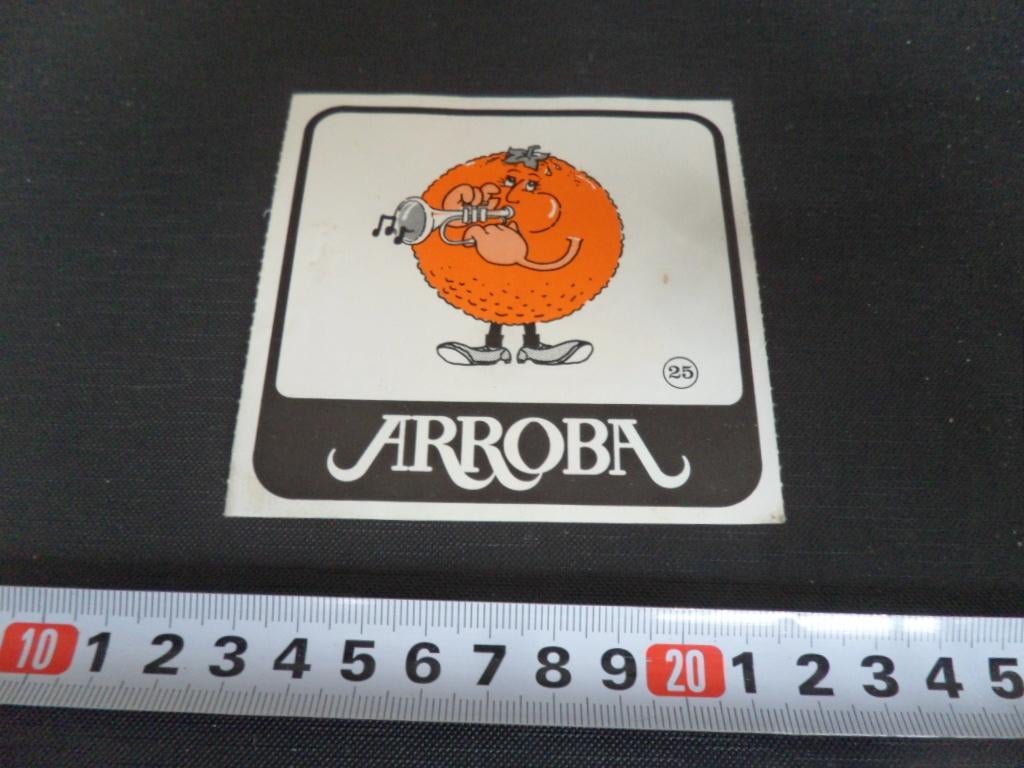 sticker arroba #25 strip sinaasappel trompettist, Ophalen, Zo goed als nieuw