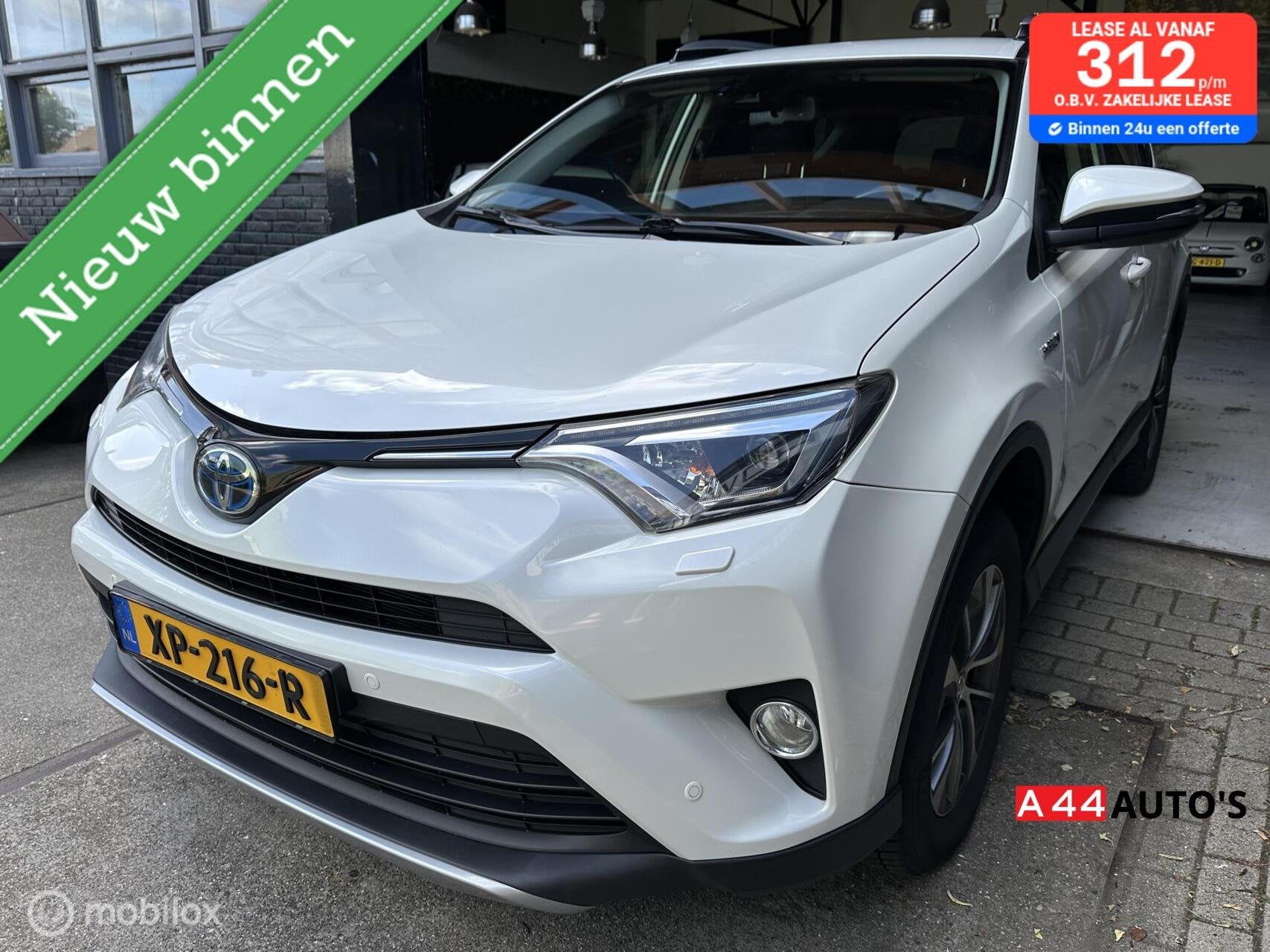 Te koop aangeboden een nette Toyota RAV4 2.5 Hybrid Dynamic*, Auto's, Stof, Wit, Bedrijf, Rav4