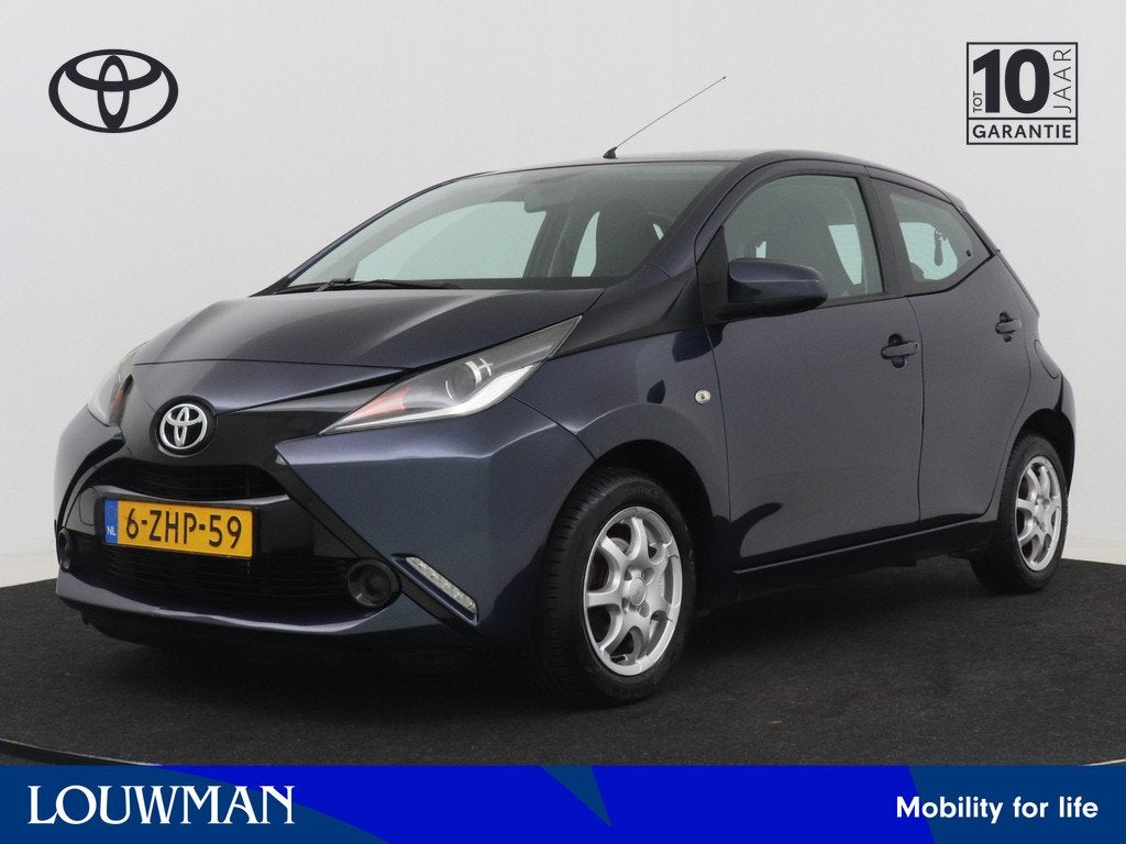 Toyota Aygo 1.0 VVT-i x-play (bj 2015, automaat), Auto's, Toyota, Stof, Gebruikt, Origineel Nederlands, Grijs