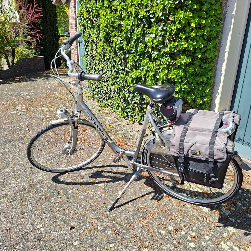 Gazelle Orange damesfiets met lage instap en fietstassen, Velgrem, Versnellingen, Ophalen of Verzenden, Gazelle