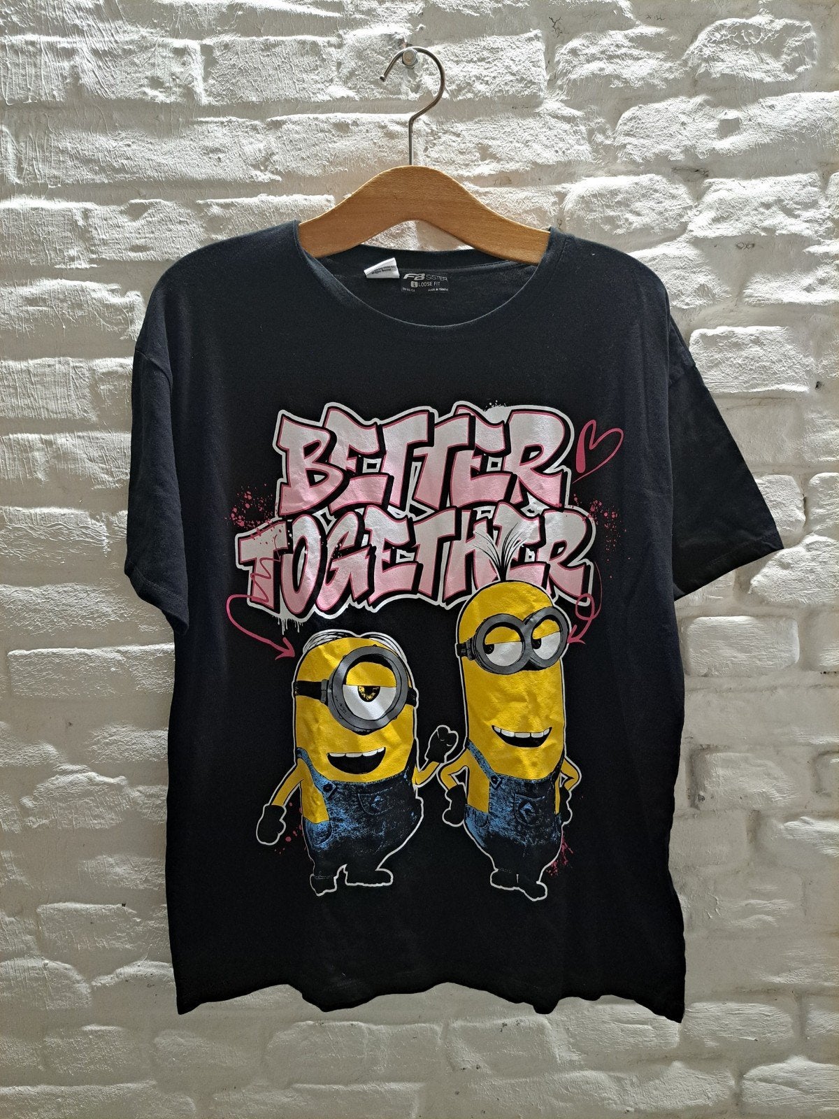 FB Sister Minions T-shirt Maat 40, Maat 38/40 (M), Verzenden, Zwart, Zo goed als nieuw