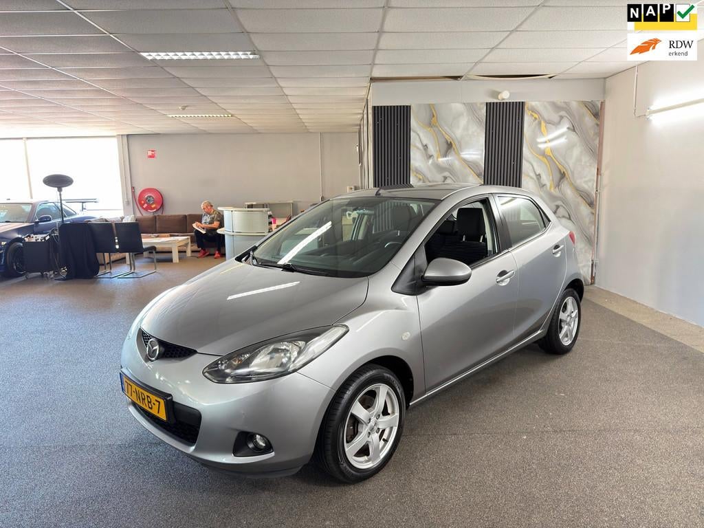 Mazda 2 1.3 S Apk NieuwDealer-Onderhouden,Airco,E-Ramen,Lm v, Auto's, Mazda, Bedrijf, Te koop, ABS, Airbags, Airconditioning, Bluetooth