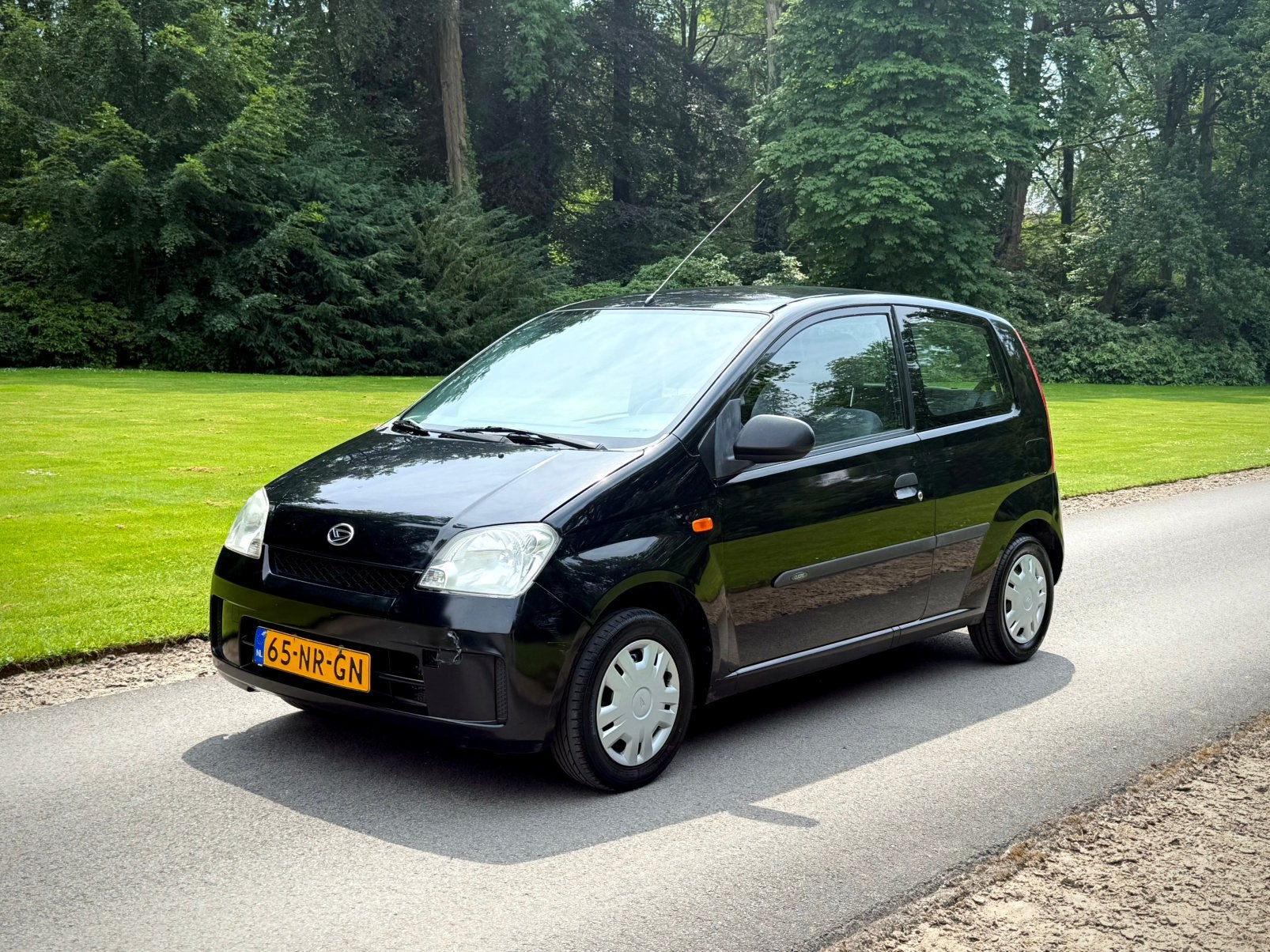 Daihatsu Cuore 1.0 3D Zwart (Nieuwe apk), Auto's, Daihatsu, 21 km/l, 18 €/maand, Cuore, Zwart