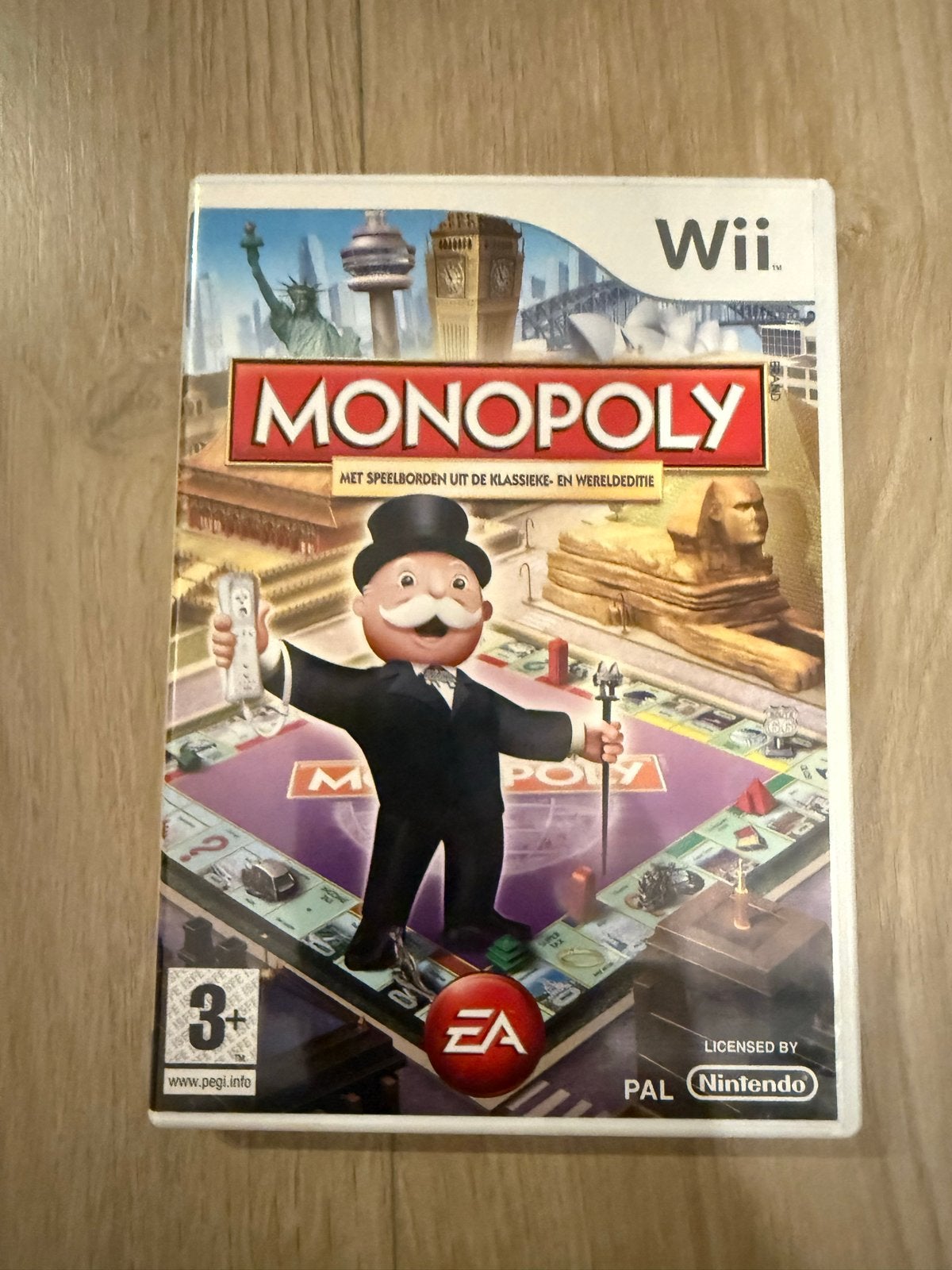 Monopoly voor Wii - Klassieke en Wereldeditie, Gebruikt, Overige genres, Ophalen of Verzenden, 3 spelers of meer