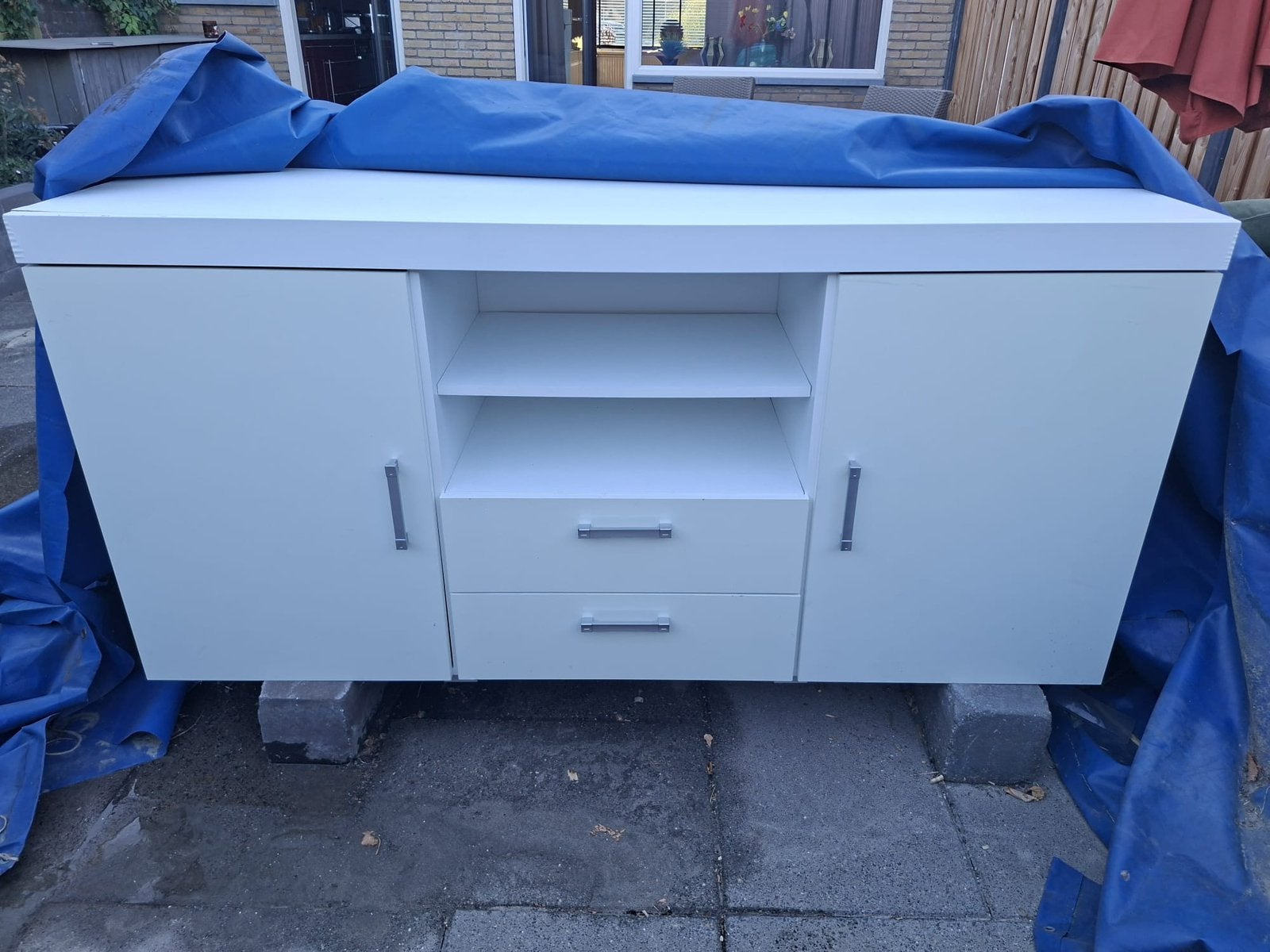 Witte dressoir/kast, Ophalen, 150 tot 200 cm, Zo goed als nieuw, Minder dan 100 cm