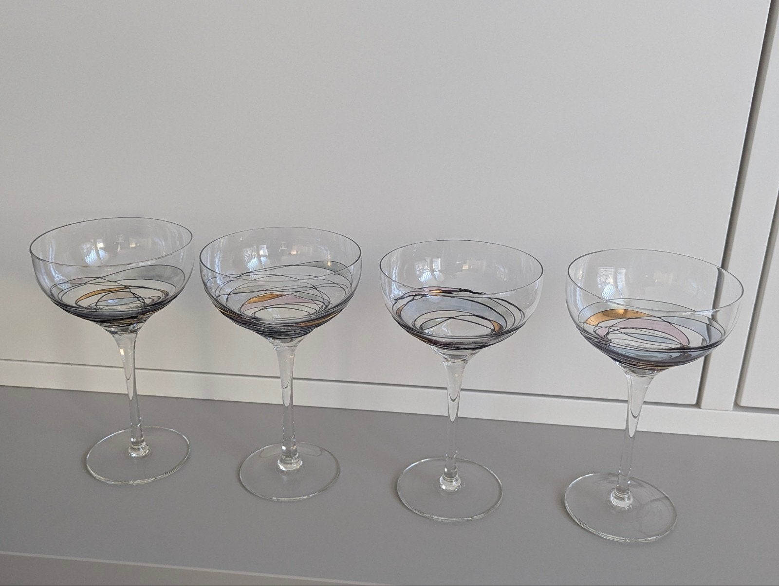 4 unieke swirl cocktailglazen champagne coups, Ophalen of Verzenden, Rond, Glas
