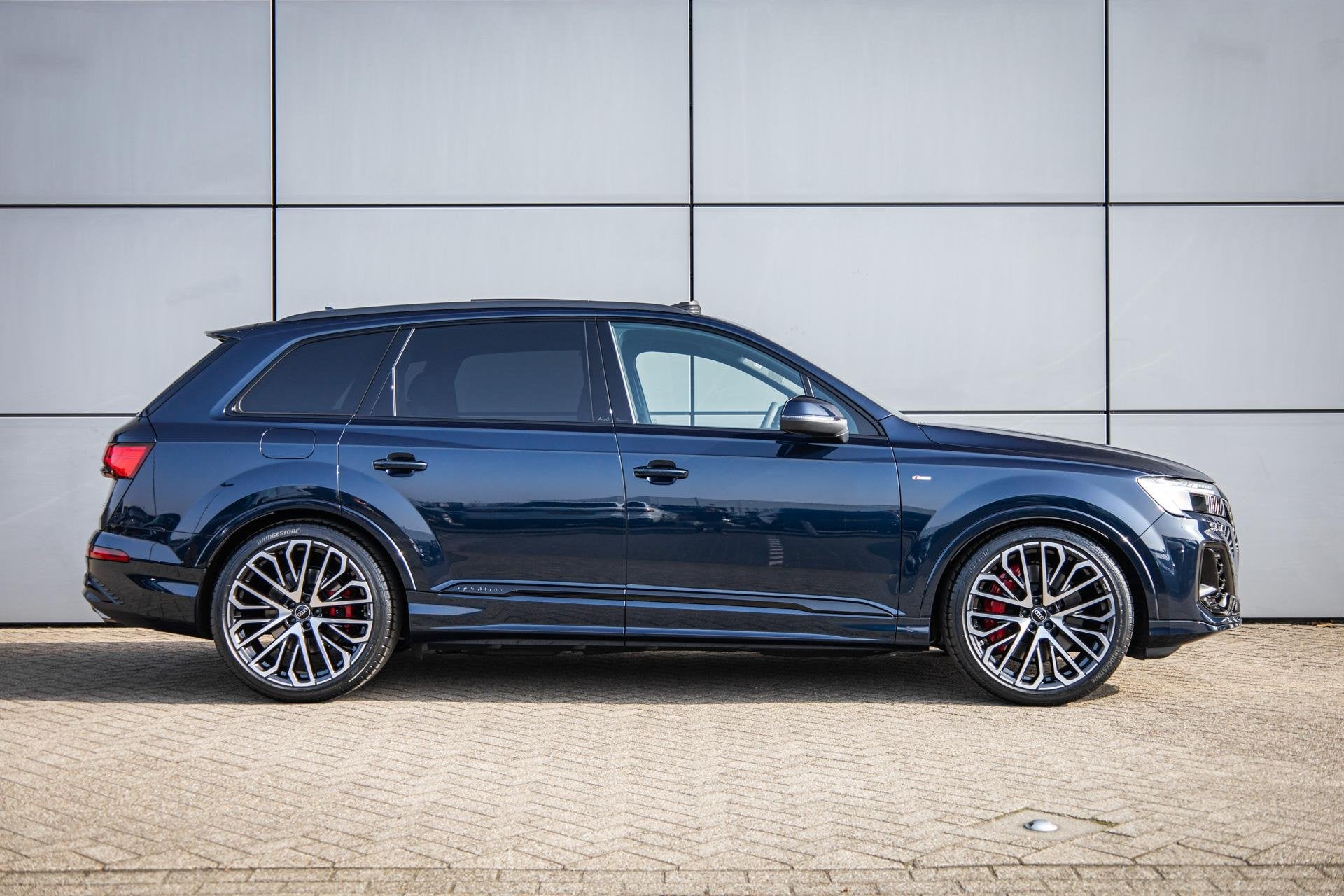 Audi Q7 55 TFSI e 394pk quattro S-line | Panoramadak | Trekh, Auto's, Automaat, 12 maanden, Blauw, 26 kWh