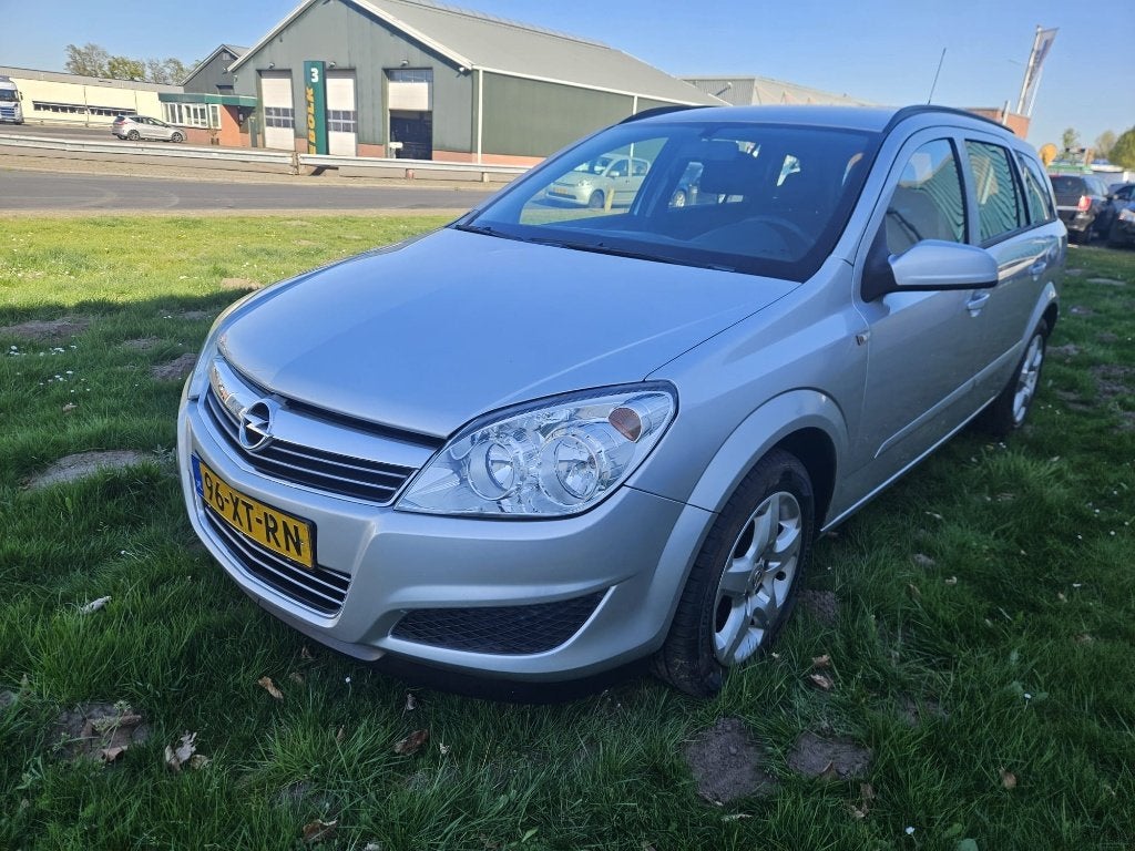 Opel Astra 1.8 16V St.wgn AUT 2007 laag KM 120960NL AUTO NAP, Auto's, 4 cilinders, 1796 cc, Origineel Nederlands, 660 kg