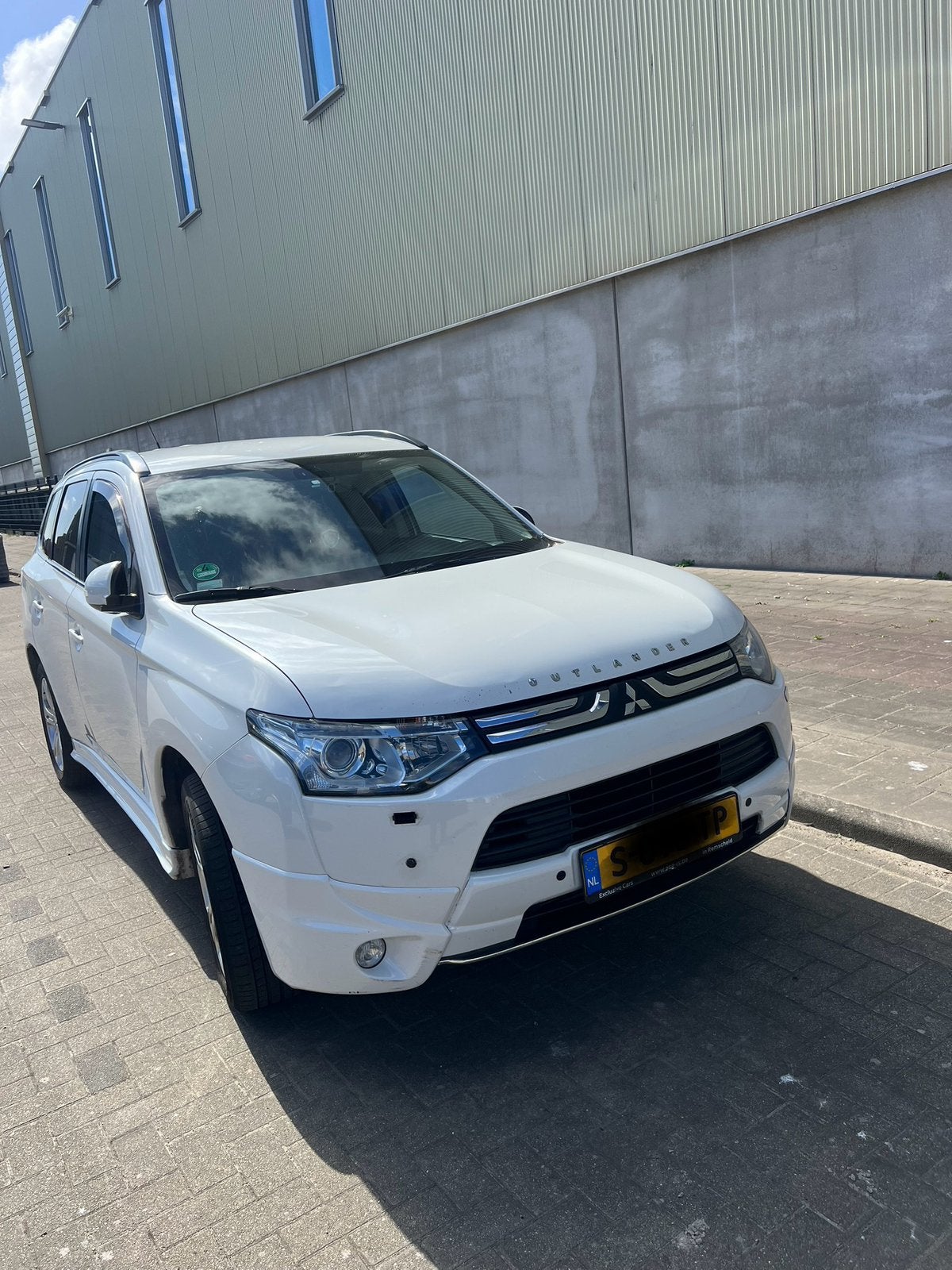 Mitsubishi Outlander 2.2 Di-d 4WD 2013 Wit, Auto's, Voorwielaandrijving, Euro 5, 4 cilinders, 2000 kg