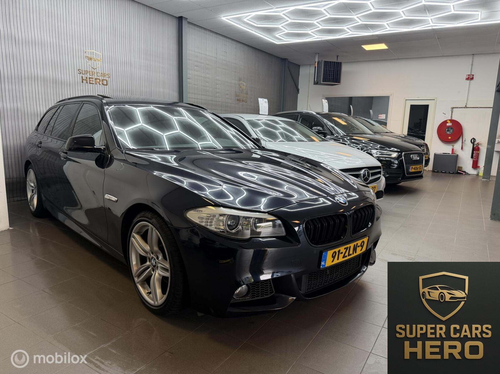 Foto 3 van BMW 5-serie Touring 520i High Executive