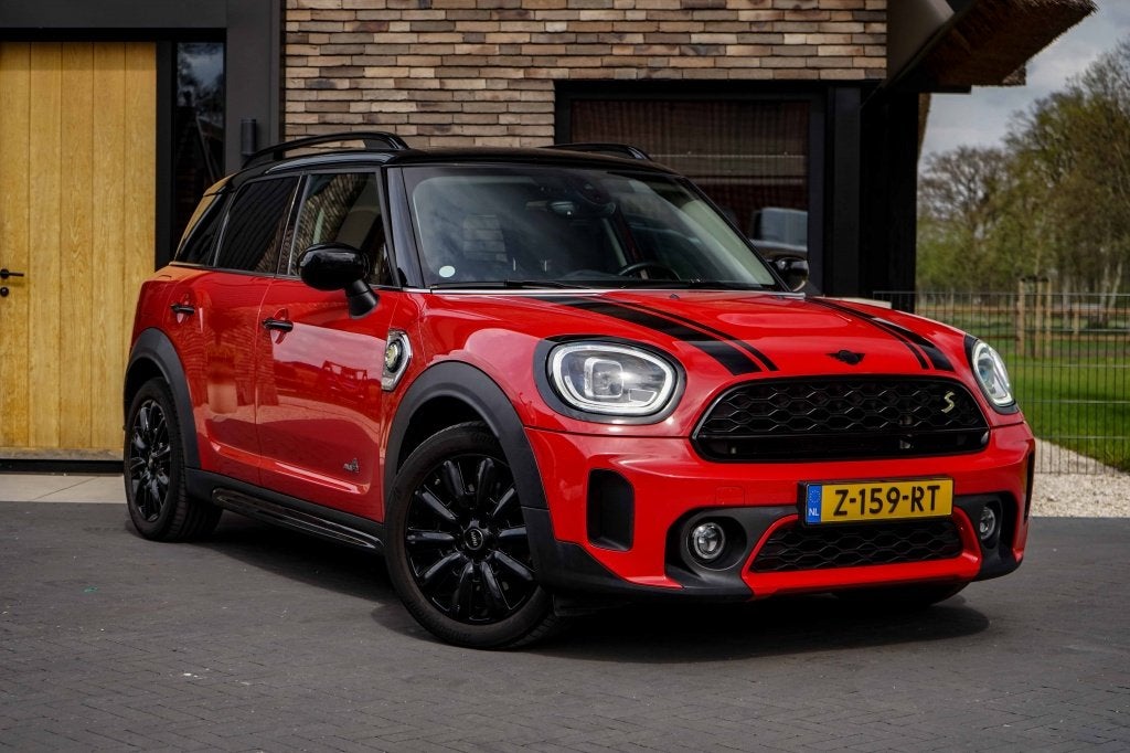 MINI Countryman Cooper SE Classic Trim All4 PHEV Chili-Red S, Auto's, Automaat, Dealer onderhouden, Stof, Gebruikt