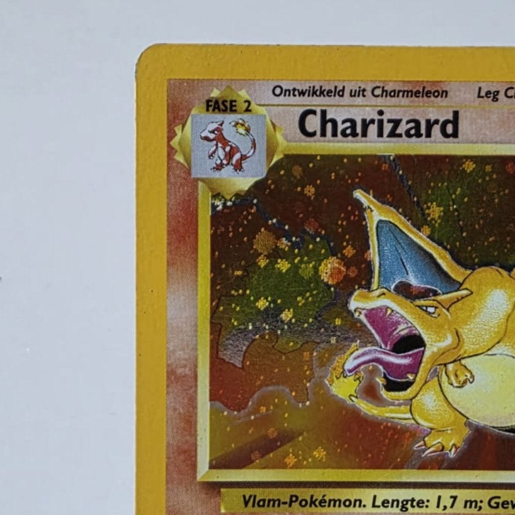 TCG Charizard BS 4 NL LP in Toploader, Gebruikt
