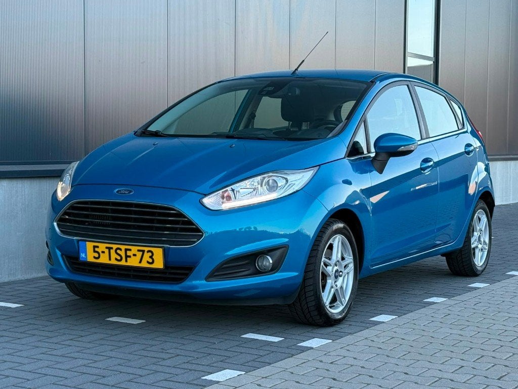 Ford Fiësta 1.0 74KW/100PK 5D 2014 Titanium PDC Trekhaak LED, Voorwielaandrijving, Stof, 40 €/maand, Blauw