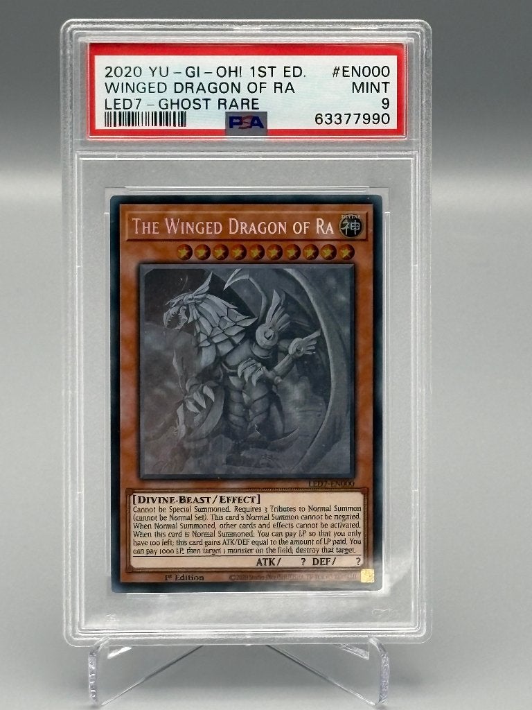 PSA 9 – Winged Dragon of Ra Ghost Rare 1st Edition Yu-Gi-Oh, Verzenden, Zo goed als nieuw, Losse kaart, Foil