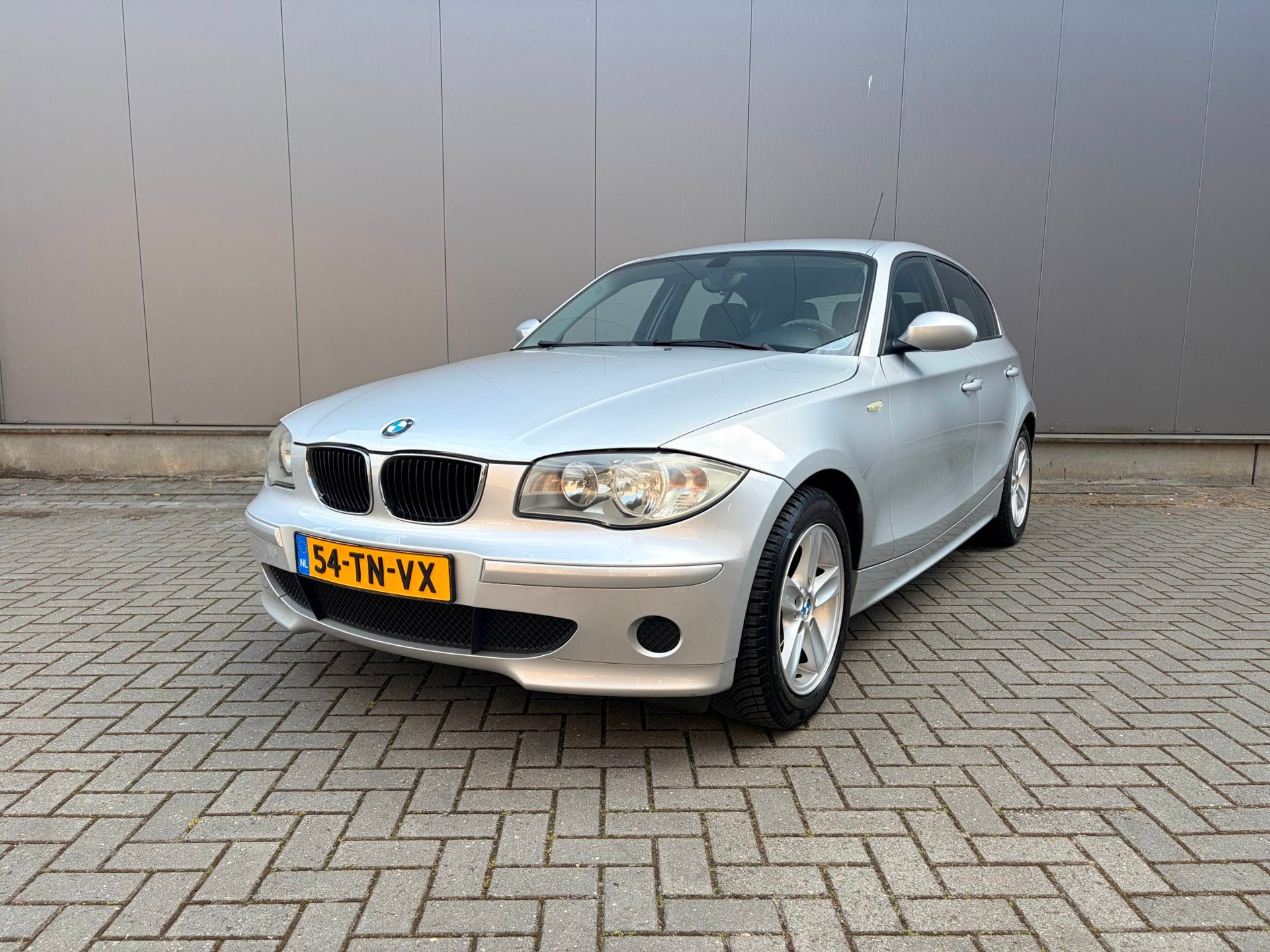 BMW 1-serie 116i Business Line, Auto's, 1596 cc, Gebruikt, Zwart, 4 cilinders