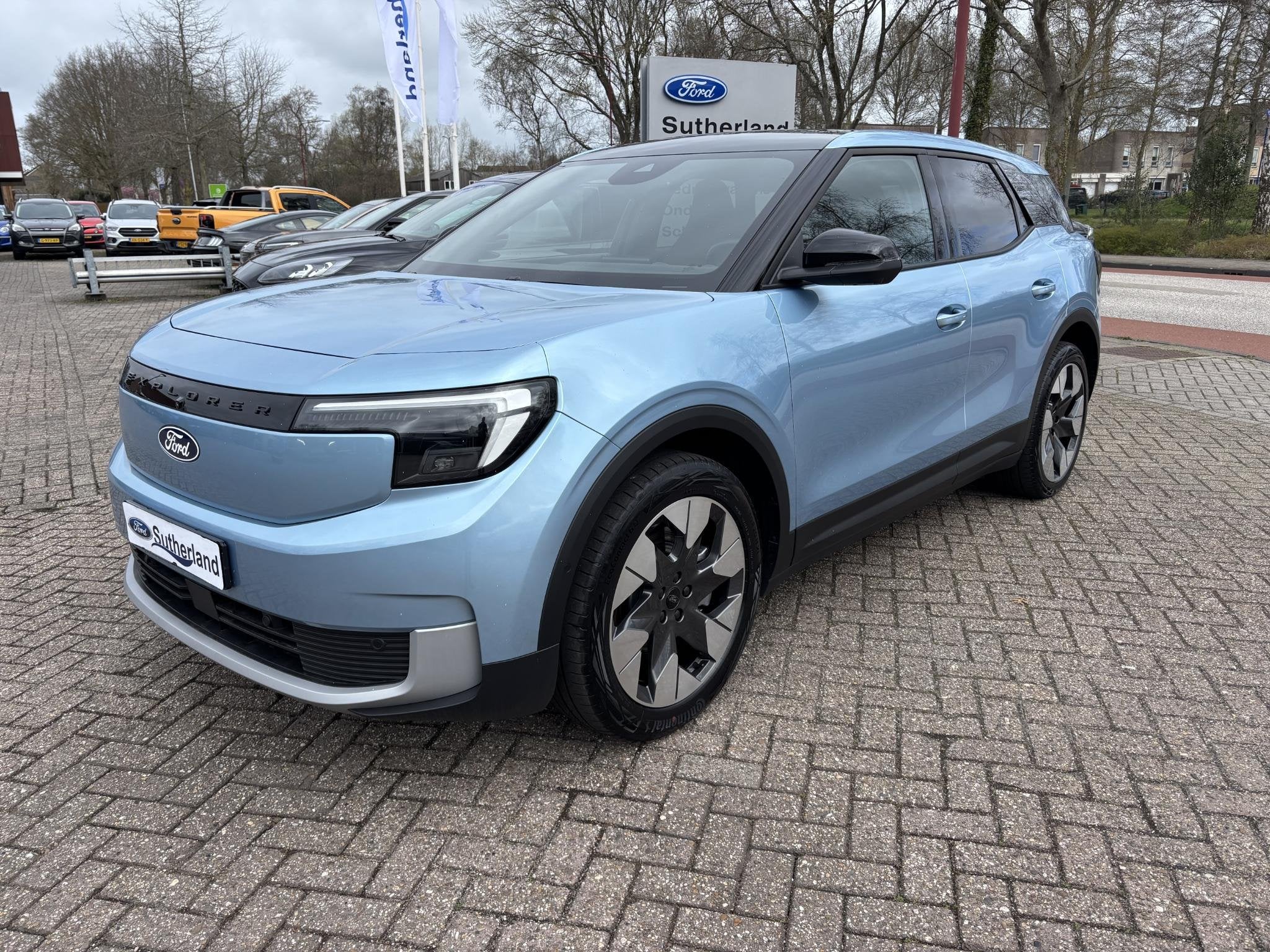 Ford Explorer Premium Extended Range AWD 79 kWh 340pk! | Vie, Auto's, Automaat, Dealer onderhouden, Gebruikt, Blauw