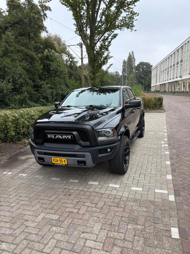 Dodge RAM 1500 Rebel 5.7 V8 2016 LPG, Auto's, Bestelauto's, Automaat, 5654 cc, Zwart, Leder