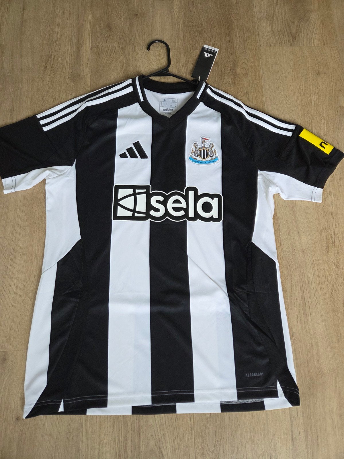 Newcastle United thuis shirt maat L - origineel en nieuw!, Ophalen of Verzenden, Nieuw, Buitenlandse clubs, Shirt
