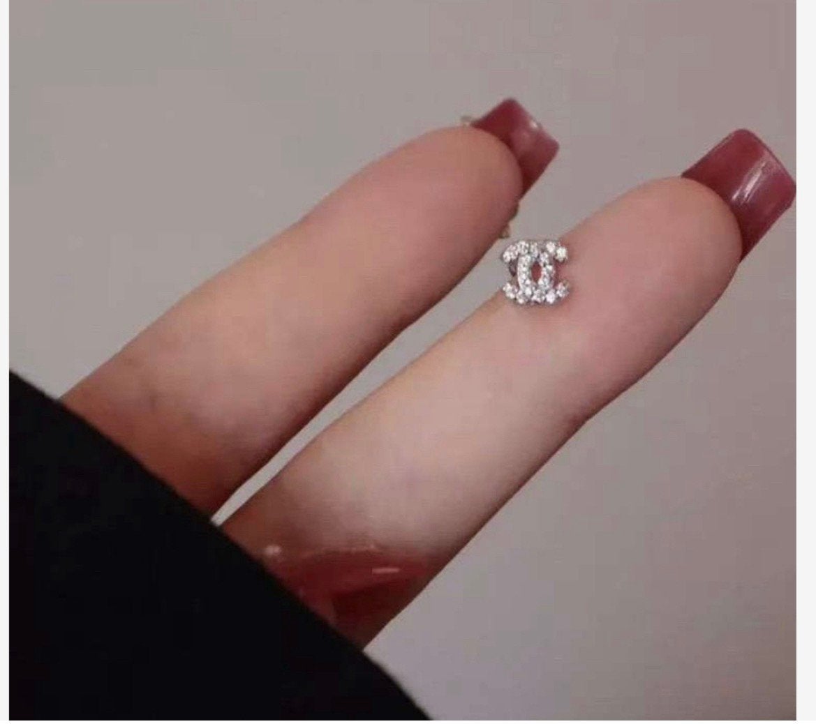 Zilveren piercing oorbel met diamantjes, Ophalen of Verzenden, Nieuw, Zilver