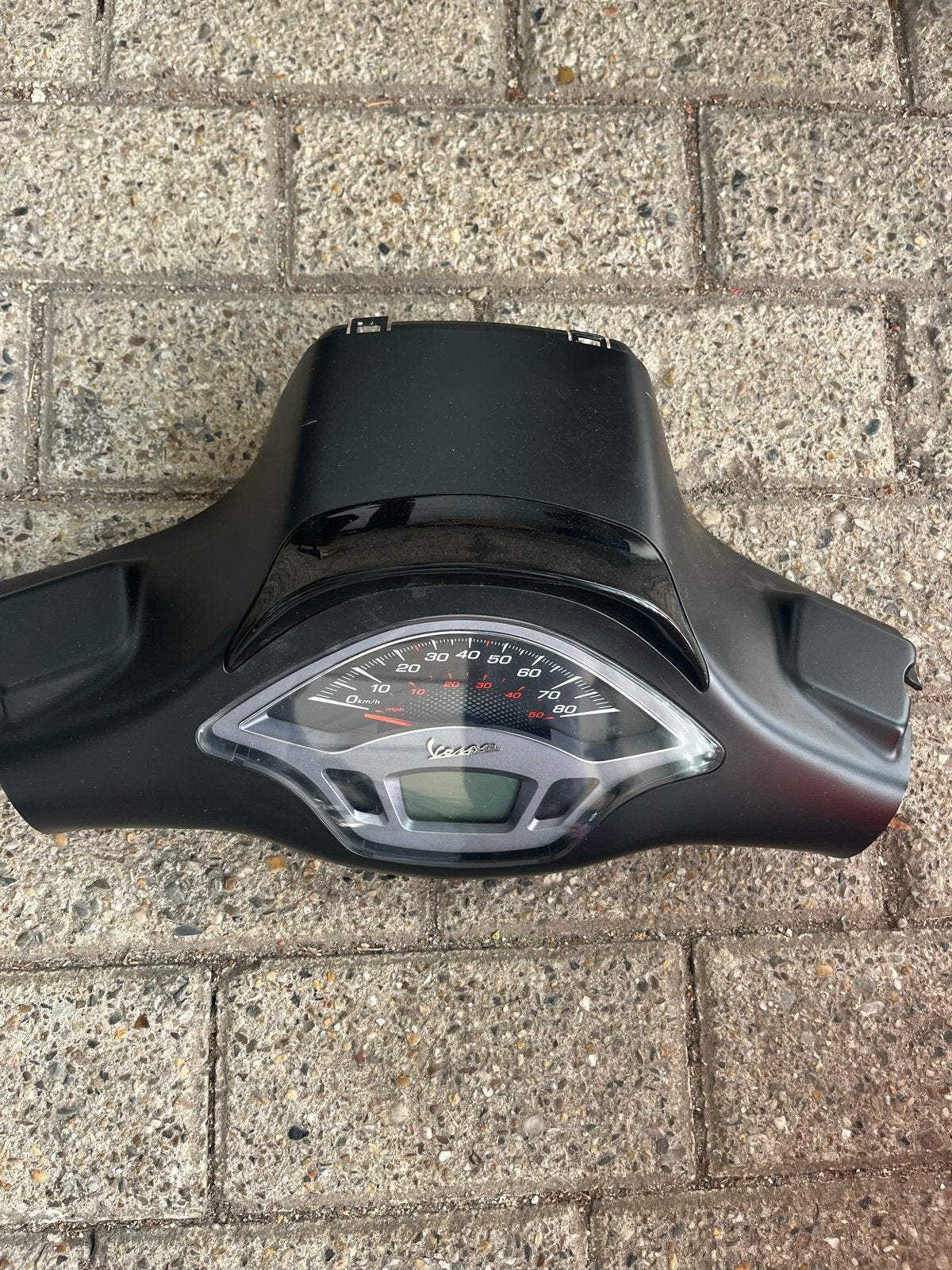 Vespa sprint teller en stuurkap, Ophalen