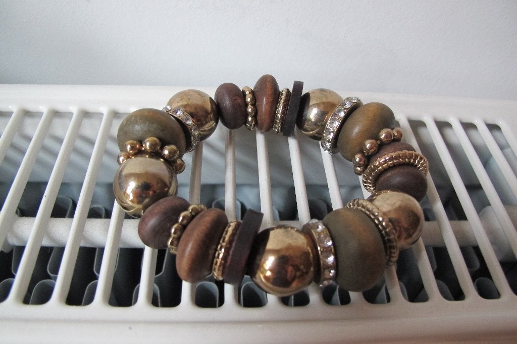 Wooden bracelet from (H&M), Sieraden, Tassen en Uiterlijk, Armbanden, Ophalen of Verzenden, Zo goed als nieuw, Bruin, Elastiek