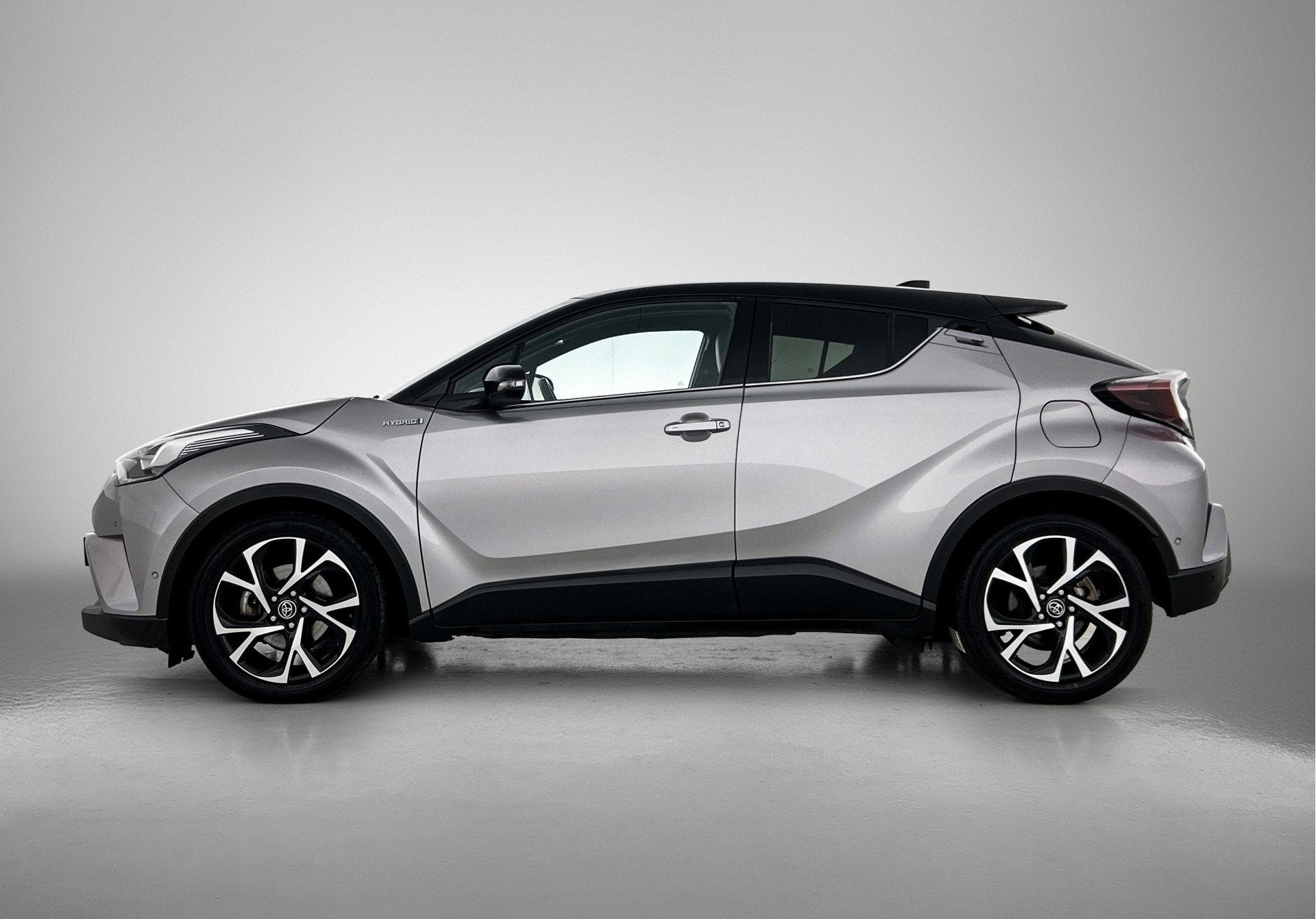Toyota C-HR 1.8 Hybrid Bi-Tone Plus | Dealer onderhouden | T, Auto's, 4 cilinders, 122 pk, 26 km/l, Hybride Elektrisch/Benzine